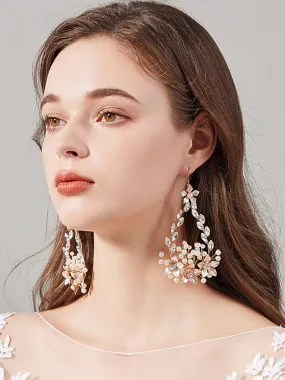 Boucles d'oreilles faites à la main avec strass et perles d'imitation au design exquis